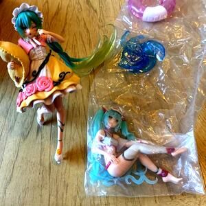 2 Taito Hatsune Miku Anime Figures: Wonderland Sleeping Beauty & Aqua Float